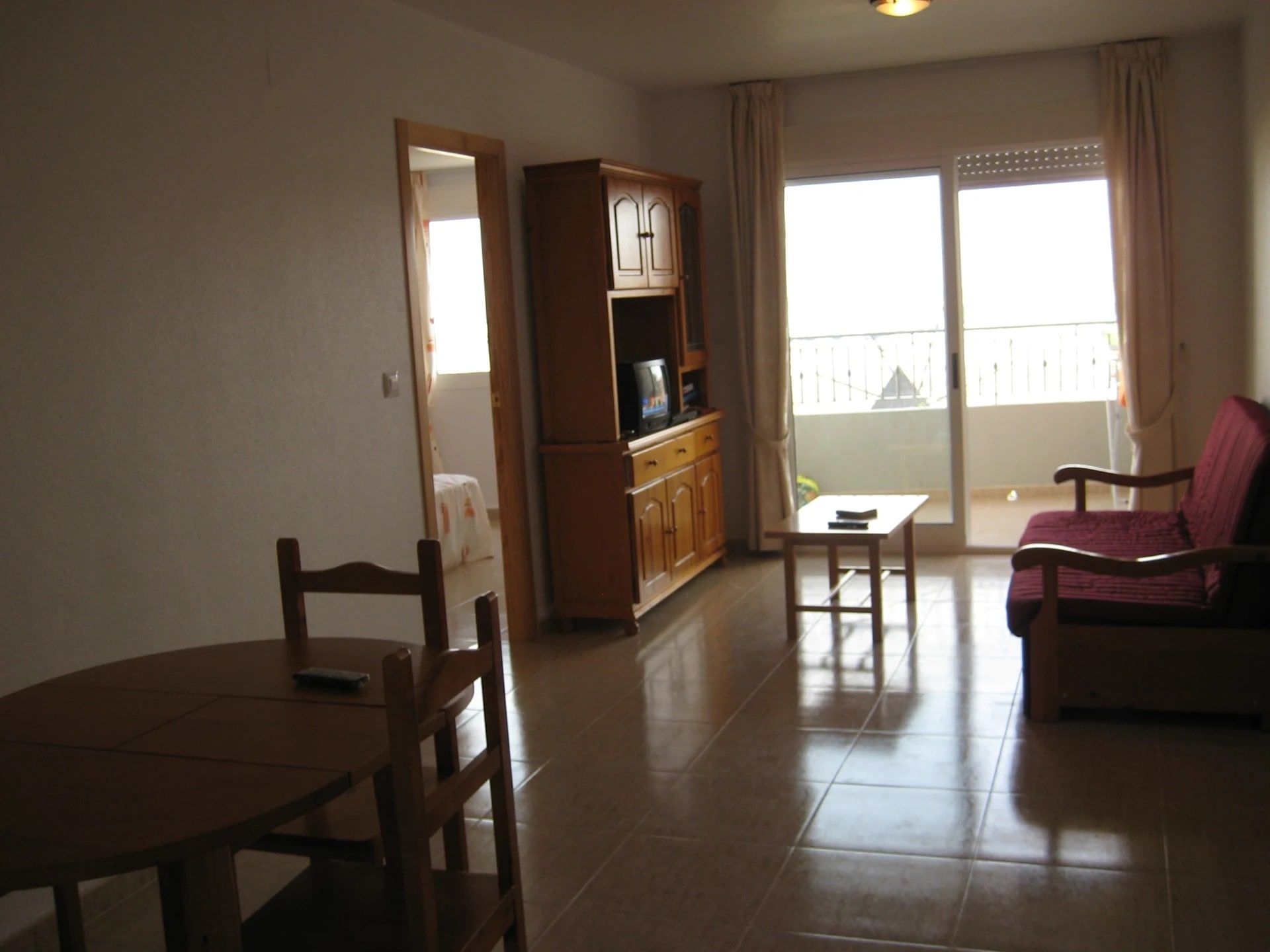 Living and dining room of Artemisa with access to the terrace